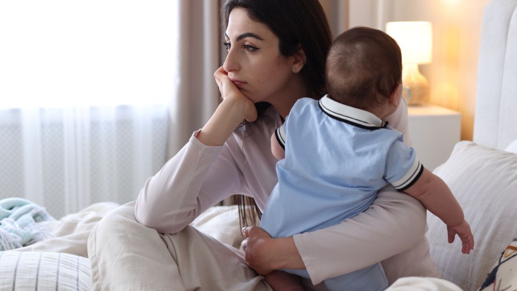 woman experiencing hormone-related mood changes after childbirth