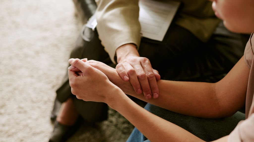 Woman discussing mood treatment options with provider
